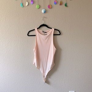 Missguided light pink bodysuit size 8